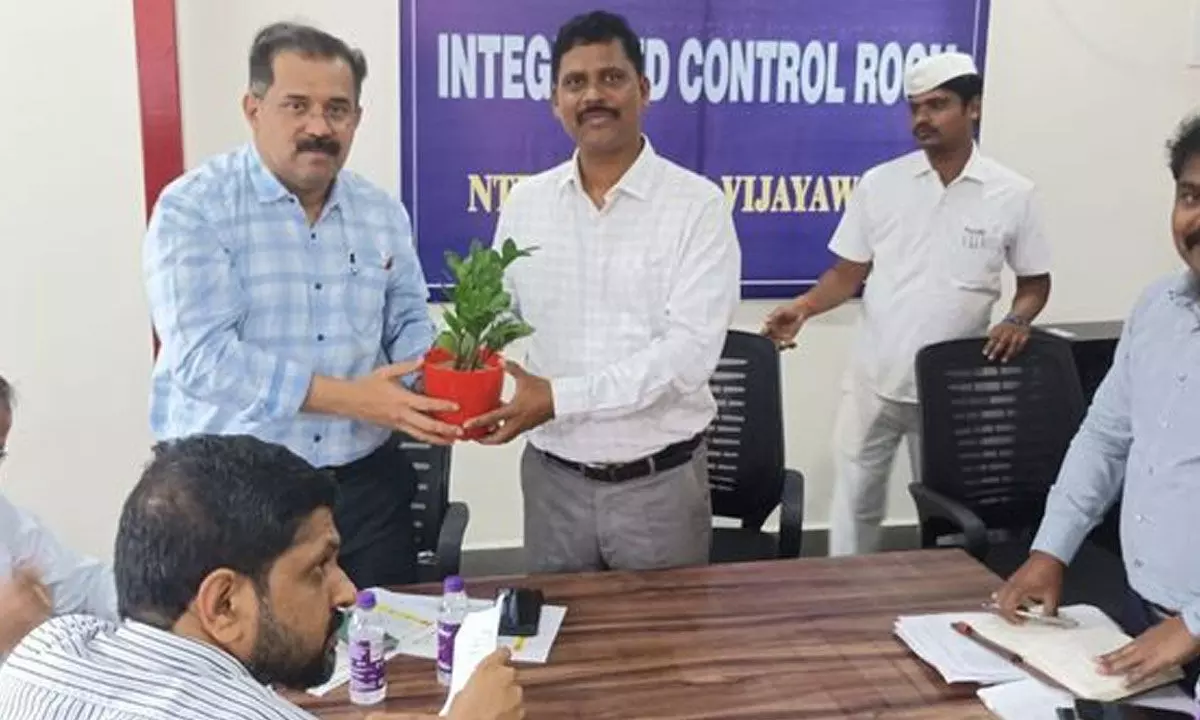 NTR district collector S Dilli Rao receiving the AP Dairy Development Co operative Federation Limited MD Babu A at the collectorate on Monday
