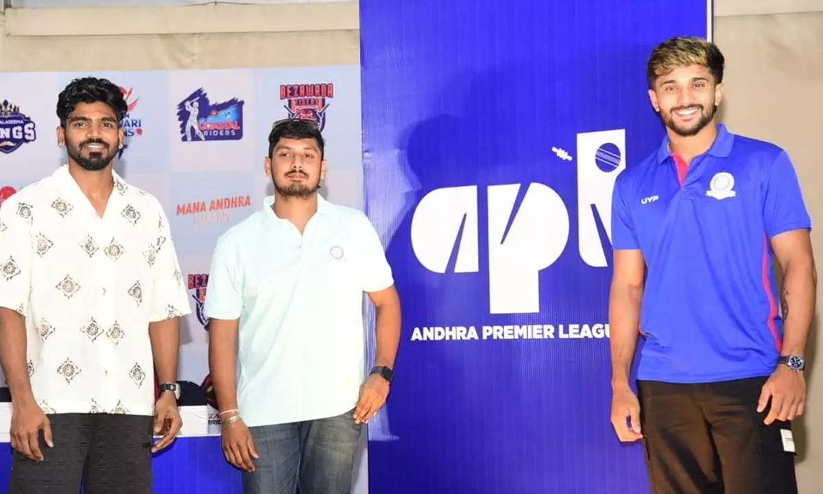 Popular IPL cricketers Nitish Kumar Reddy, K S Bharat and Ricky Bhui after unveiling APL new logo in Visakhapatnam on Monday