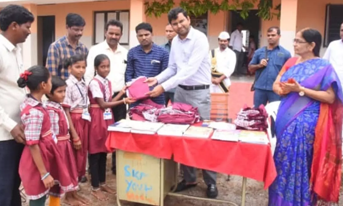 D C BM Santhosh Distribute Uniforms for School children