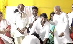 Pawam Kalyan touches feet of his brother mega star Chiranjeevi