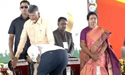 Nara Lokesh touches Naidus feet and blessings of PM Governor and Amit Shah. PM and Amit Shah hug him.