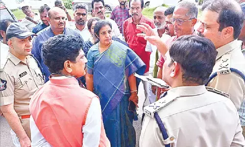 BJP state president D Purandeswari and other party leaders inspect the venue of swearing-in ceremony of new goverment at Gannavaram airport near Vijayawada on Tuesday