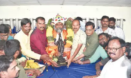 Tirupati Press Club committee felicitating Puthalapattu MLA Dr K Murali Mohan on Sunday. Press Club president Bhaskar Reddy and secretary Balachandra are also seen. 