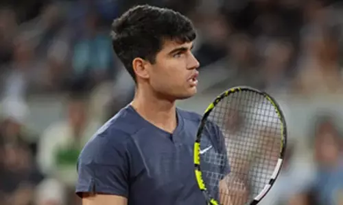 Tennis: Alcaraz eyes grass-court glory after French Open triumph