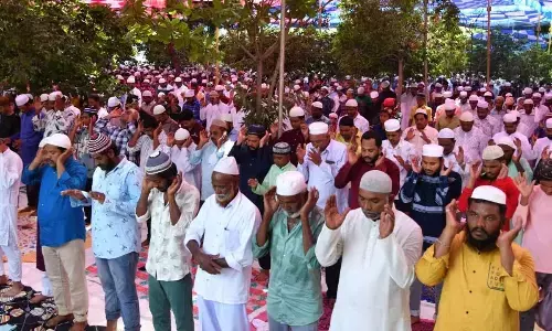 Muslims taking part in special prayers at the Eidgah in Ongole on Monday