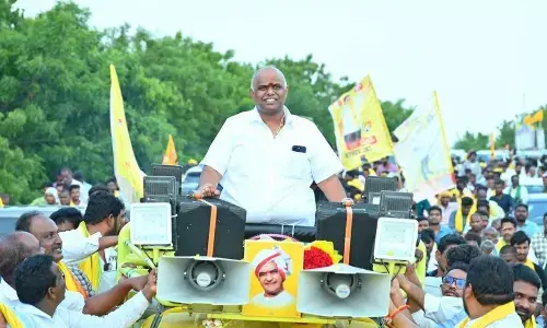 Minister for Revenue, Stamps and Registrations Anagani Satya Prasad participating in a rally in Repalle on Monday