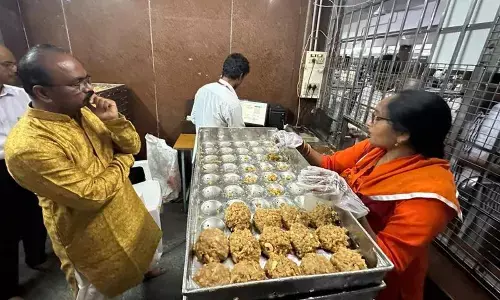 The EO inspect the laddu counters