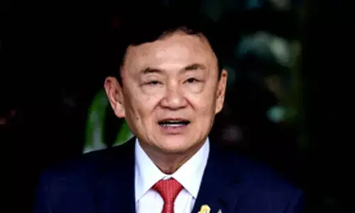 Former Thai prime minister to face defamation of monarch charge