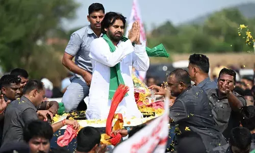 Andhra Pradesh Deputy Chief Minister and Jana Sena chief Pawan Kalyan being welcomed by supporters, in Amaravati on Tuesday 					            Photo: Ch Venkat Mastan