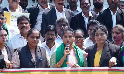 Guntur West MLA Galla Madhavi addressing a meeting at district registrar’s office in Guntur on Tuesday