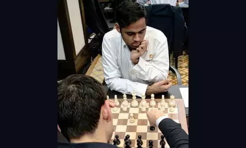 Arjun Erigasi wins title, regains fourth spot