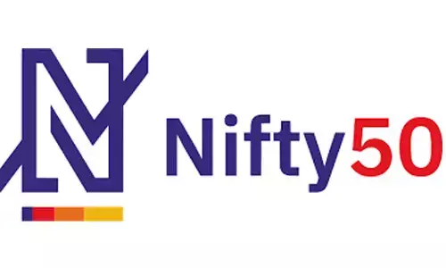 Nifty retreats from record high