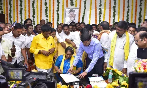 Savithamma Assumes Charge as Minister, Signs Free DSC Coaching File