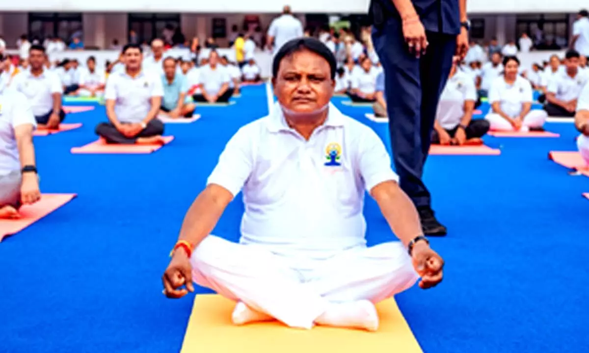 Odisha CM performs asana on International Day of Yoga