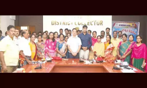 District Collector Pravin Kumar, Joint Collector HM Dhyana Chandra and others at the Revenue Day programme in Tirupati on Thursday
