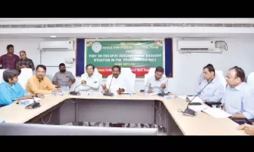Minister DSBV Swamy explaining drought conditions in Prakasam district to the IMCT for Drought members at collectorate in Ongole on Thursday