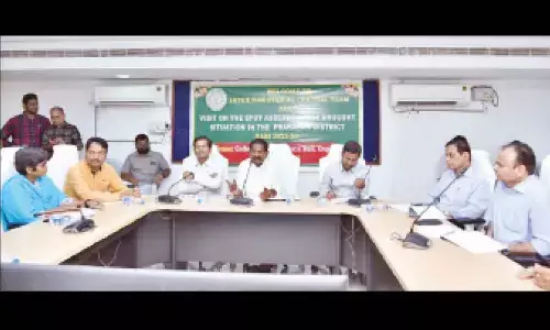 Minister DSBV Swamy explaining drought conditions in Prakasam district to the IMCT for Drought members at collectorate in Ongole on Thursday