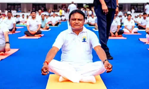 Odisha CM performs asana on International Day of Yoga