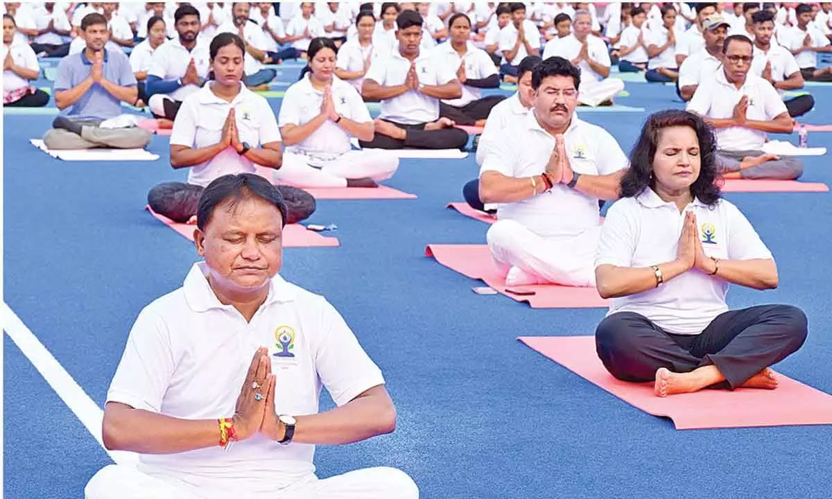 CM Mohan Charan Majhi leads Yoga Day celebration