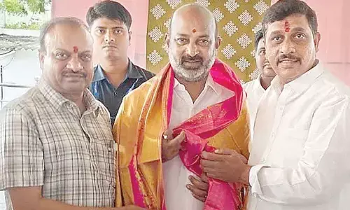 Galla Satyanarayana invites Union Minister Bandi Sanjay Kumar