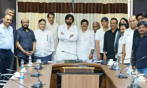 Telugu film producers C Ashwini Dutt, Allu Aravind,  AM Ratnam,  S Radhakrishna (Chinababu), Dil Raju, and other members with Deputy Chief Minister Pawan Kalyan at camp office in Vijayawada on Monday
