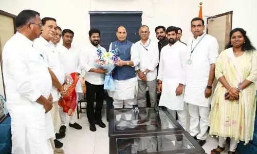 Chief Minister Revanth Reddy meeting Defence Minister Rajnath Singh along with MPs Mallu Ravi, Raghurami Reddy, Balaram Naik, Suresh Shetkar, Chamala Kiran Kumar Reddy, Raghuveer Reddy, Kadiyam Kavya, Gaddam Vamsi and Anil Kumar in Delhi on Monday
