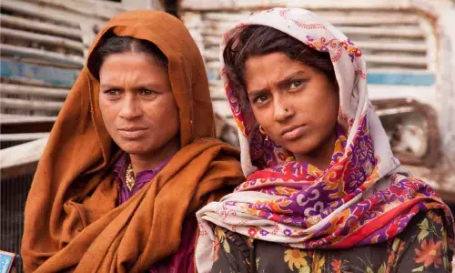 Fighting for survival: Climate change pushes women to limits of endurance