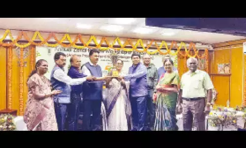 KVK Head G Dhanalakshmi holding the trophy of Best Zonal KVK-2024
