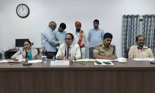 District Chief Justice review meeting with officials