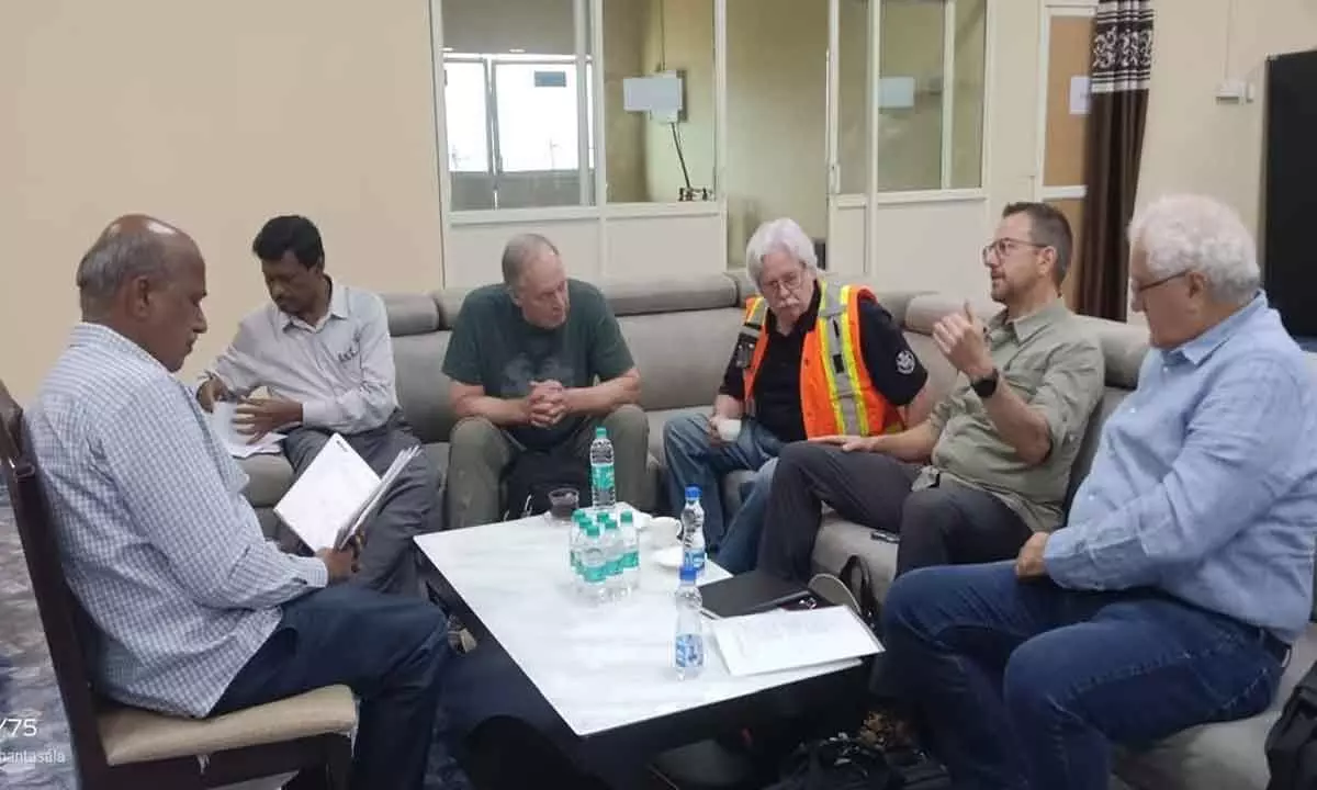Water Resources experts from US and Canada discussing with irrigation officials during their visit to the Polavaram project on Sunday