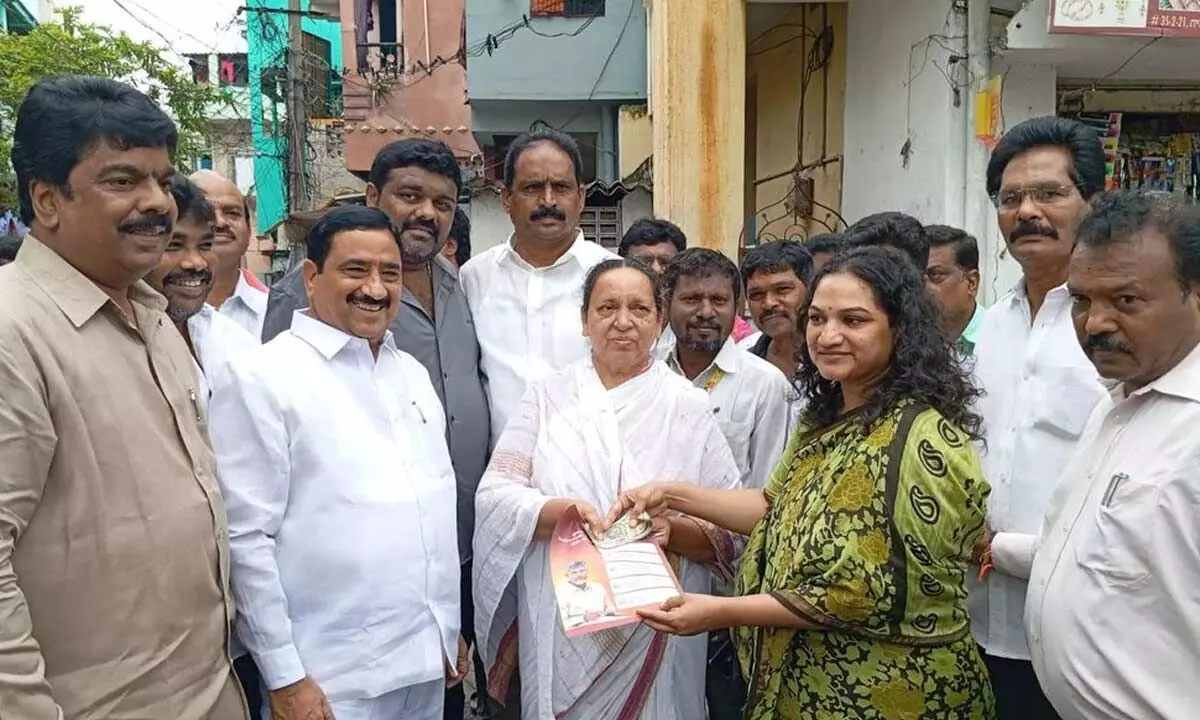 NTR District Collector Dr G Srijana distributing NTR Bharosa pensions in Vijayawada on Monday