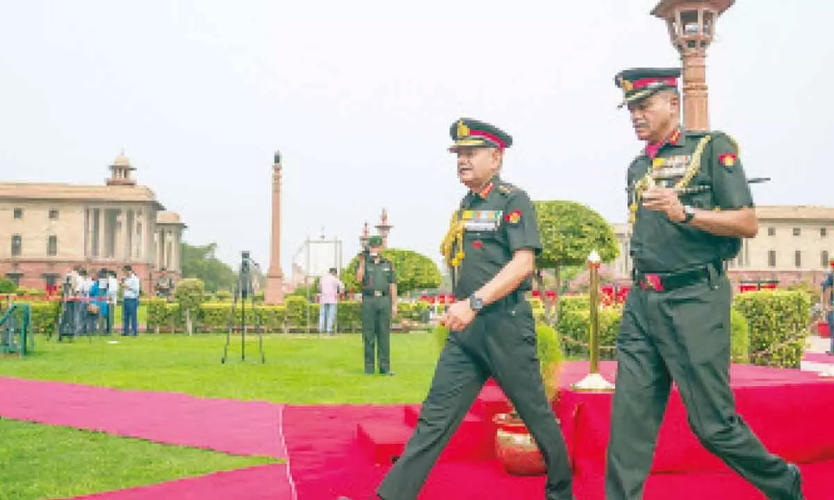 General Upendra Dwivedi (left) arrives to inspect a Guard of Honour, a day after taking charge as the 30th Chief of the Army Staff