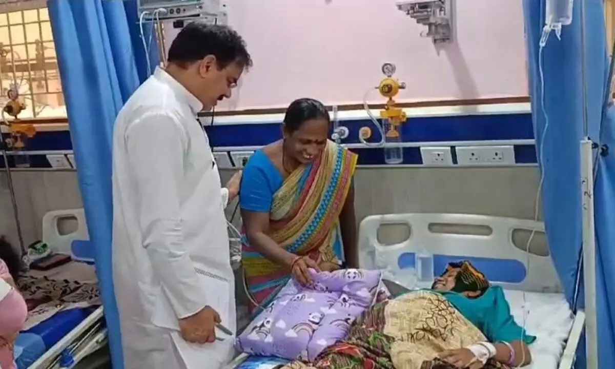 Minister for Civil Supplies Dr Nadendla Manohar interacting with patients at GGH in Tenali on Tuesday