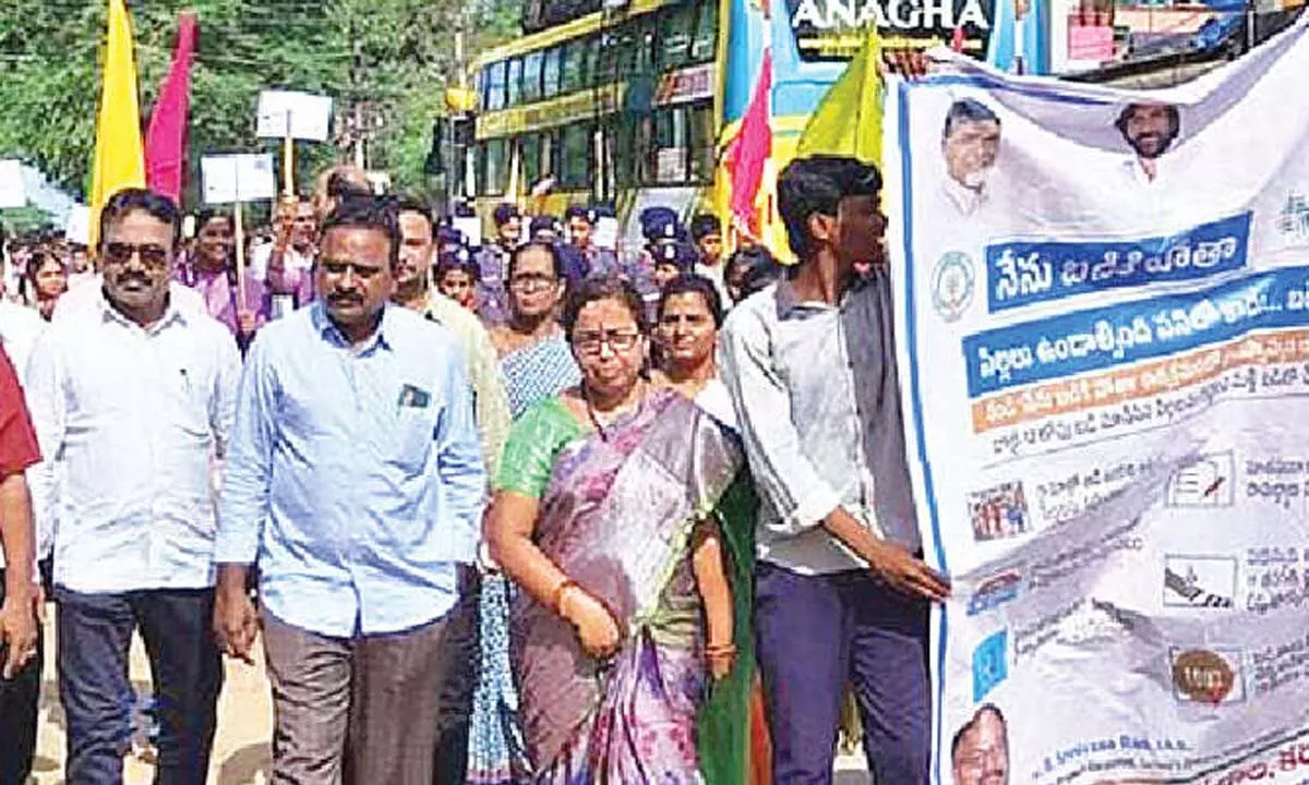 Tirupati DEO Dr V Sekhar and others taking part in ‘Nenu Badiki Potha’ rally at Karakambadi  ZP High School on Tuesday