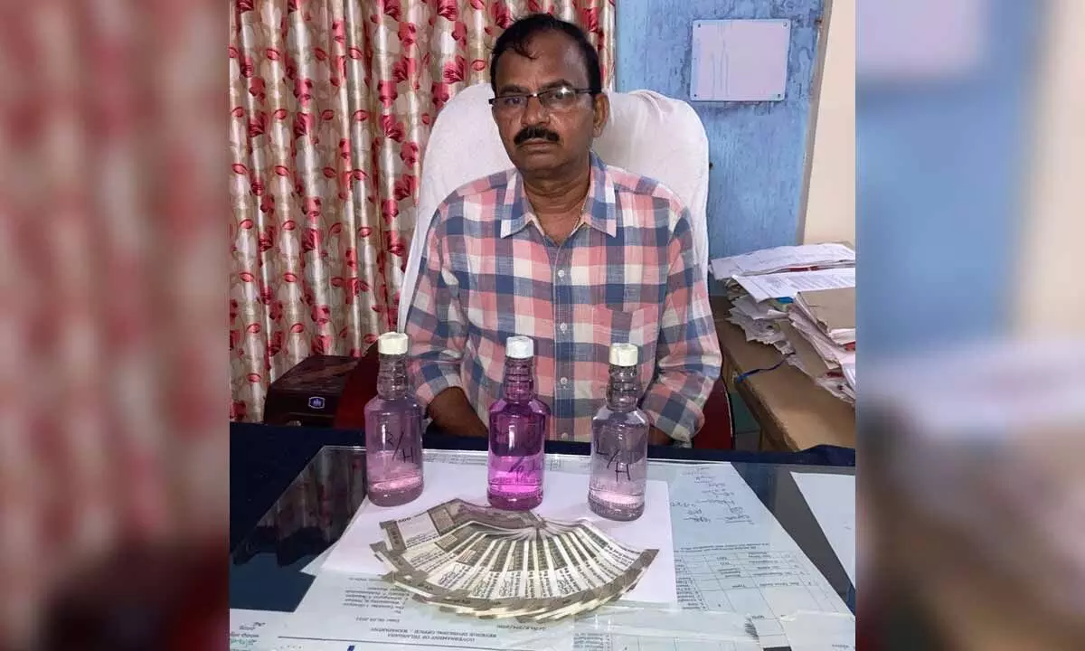Gopalpet Tahasildar Caught Red-Handed Taking Bribe from Farmer