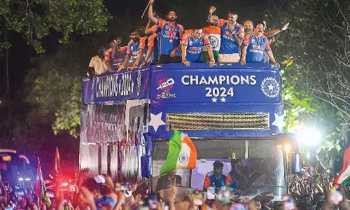 Champions get euphoric welcome