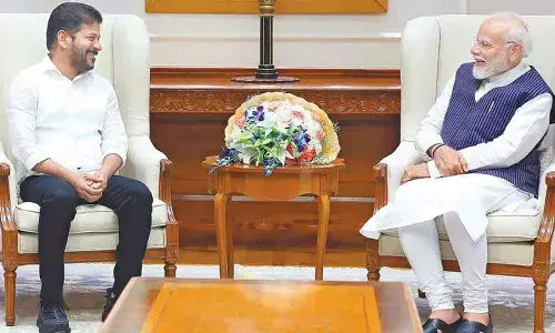 CM meets PM, seeks more funds for TG