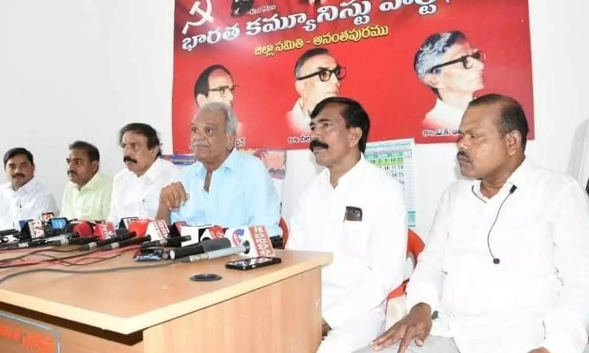 CPI national secretary K Narayana and State secretary K Ramakrishna addressing a press  conference in Anantapur on Sunday