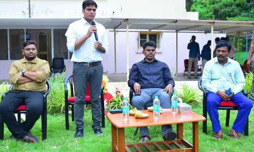 Outgoing Sri Sathya Sai District Collector P Arun Babu speaking at a farewell function in Puttaparthi