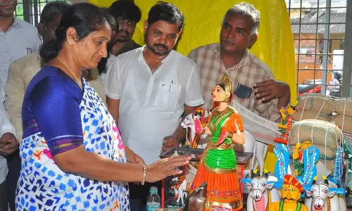 Minister for BC Welfare, Handlooms and Textiles S Savitha at a toys shop at Kondapalli in NTR district on Monday