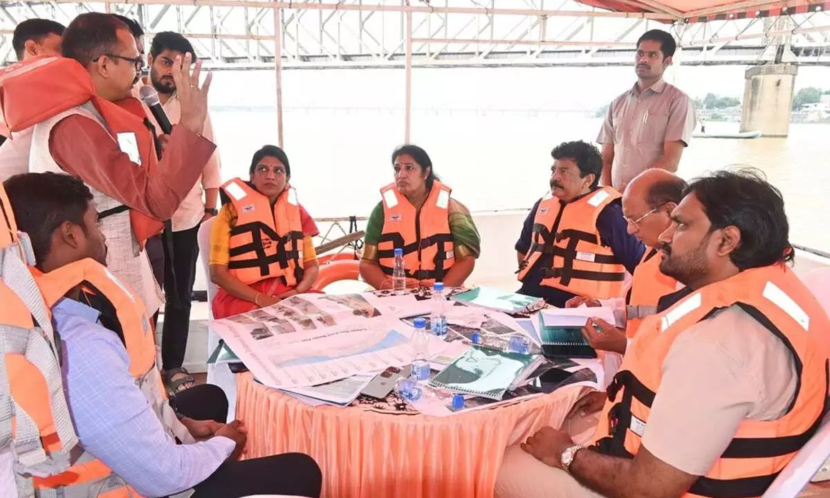 Minister Kandula Durgesh, MP Daggubati Purandeswari, MLAs Gorantla Butchaiah Chowdary, Adireddy Vasu and Collector Prasanthi on a tour in River Godavari on Tuesday