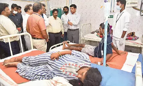 District Collector Dr S Venkateswar visiting the diarrhoea patients at Ruia hospital in Tirupati on Tuesday. DM&HO Dr U Sreehari and other officials are seen.