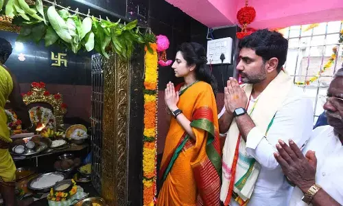 Minister Nara Lokesh couple performing puja at Goddess Ganganamma temple on Sunday