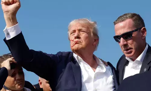 Trump survives assassination bid