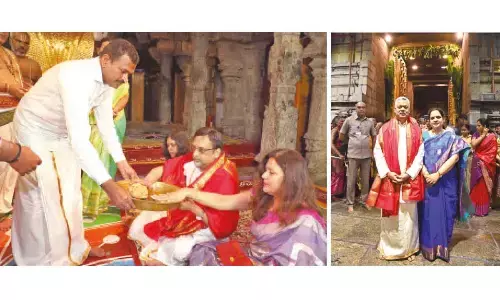 TTD JEO Veerabhadram presenting teertha prasadams to Chief Secretary Neerabh Kumar Prasad and his wife after the darshan at Sri Venkateswara temple on Sunday; DGP Ch Dwaraka Tirumala Rao and his wife at the temple after having darshan of Sri Venkateswara Swamy on Sunday