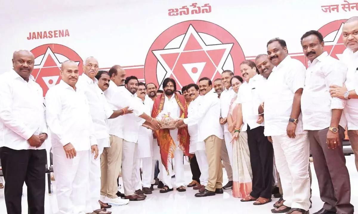 Jana Sena Party MLAs and MPs, leaders felicitating party chief and Deputy Chief Minister Pawan Kalyan at party office in Mangalagiri on Monday