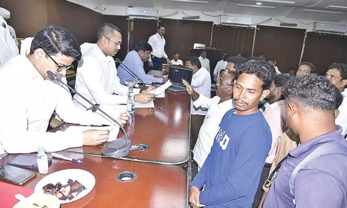 Collector Shyam Prasad receiving grievances from people at ITDA Seethampeta on Monday