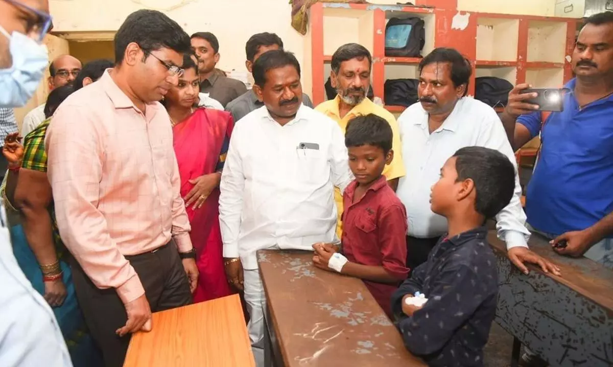 Social Welfare Minister Dola Balaveeranjaneya Swamy and Tirupati Collector Venkateswar at the social welfare hostel at Naidupeta on Monday