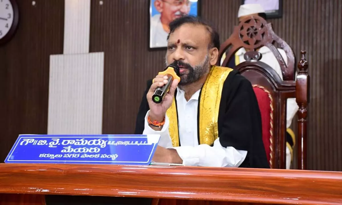 Mayor B Y Ramaiah presiding over the municipal council meeting in Kurnool on Monday