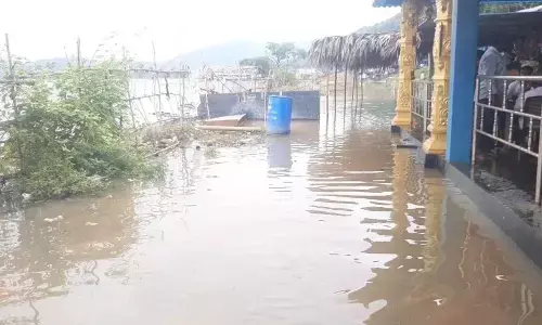 Godavari water entered Gandi Pochamma temple premises in Devipatnam mandal of Alluri Sitarama Raju district on Monday